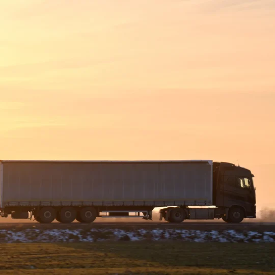 semi-truck-with-cargo-trailer-driving-on-highway-h-2022-10-31-22-23-52-utc-540x540.webp